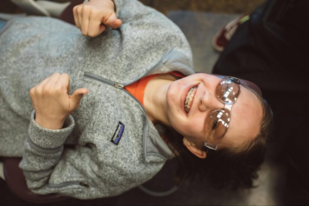 Smiling orthodontic patient with braces at Master Orthodontics in Bremerton